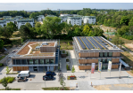 Fotografie - Im Bild links ist der MINT-Kindergarten und rechts RUBINA, das Haus für Energie- und Umweltbildung der Stadt Regensburg, zu sehen

