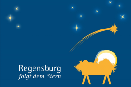 Grafik – Sujet des Ökumenischen Krippenwegs, gelbe Krippe auf blauem Hintergrund mit Sternen und dem Schriftzug „Regensburg folgt dem Stern“