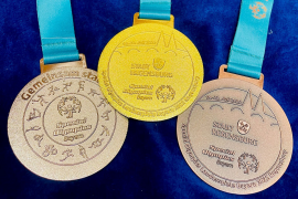 Fotografie: Medaillen in Gold, Silber und Bronze