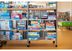 Fotografie - Spiele im Regal in der Stadtteilbücherei Süd.