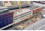 Fotografie - Rohbau mit Obergeschossen von der Greflinger Straße aus