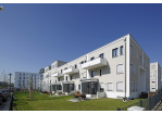 Fotografie - weiße Neubauten in einem Wohngebiet (C) Bilddokumentation Stadt Regensburg