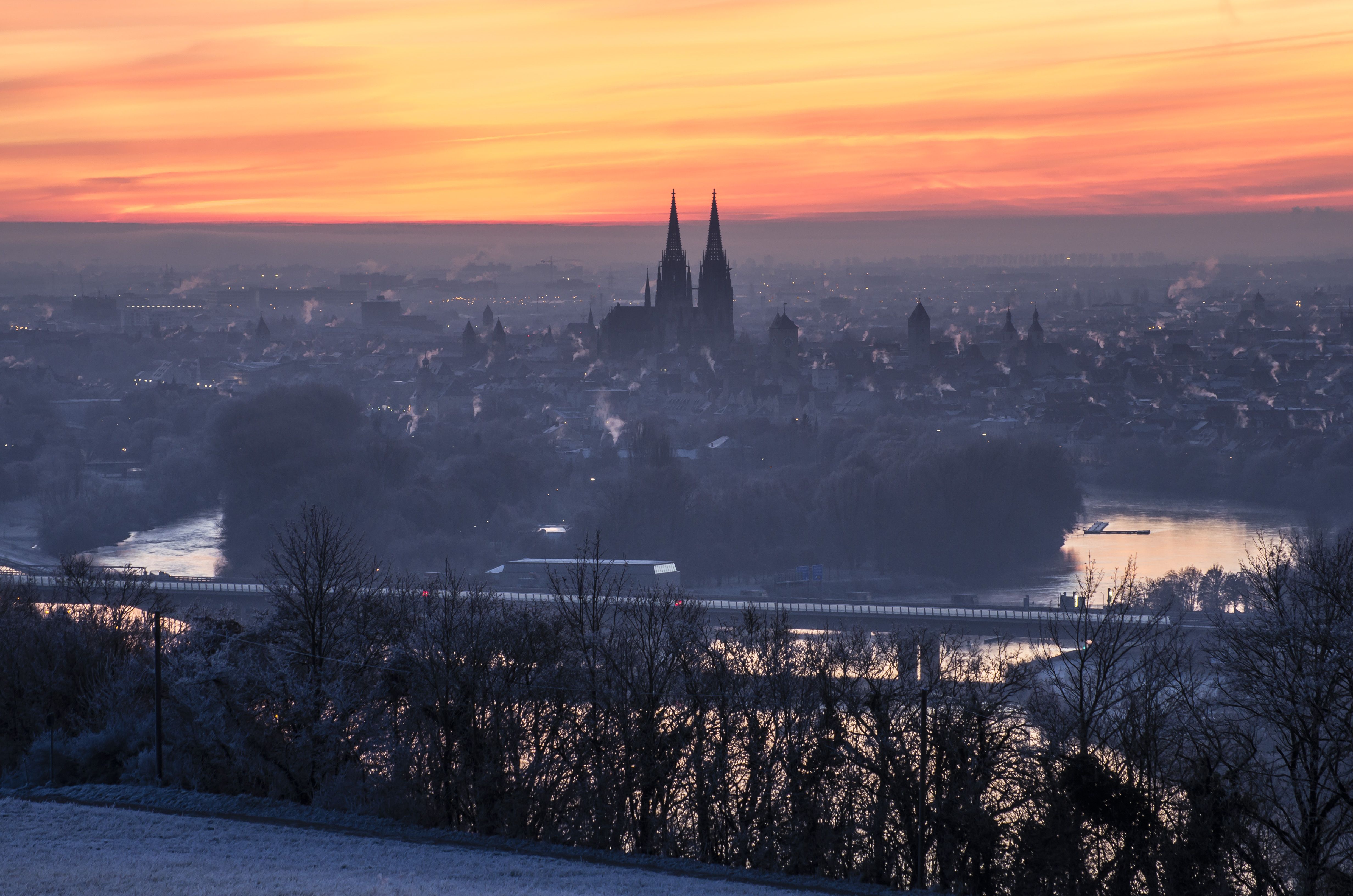 Fotografie: Blick von den Winzerer Höhen auf die Altstadt im Sonnenuntergang