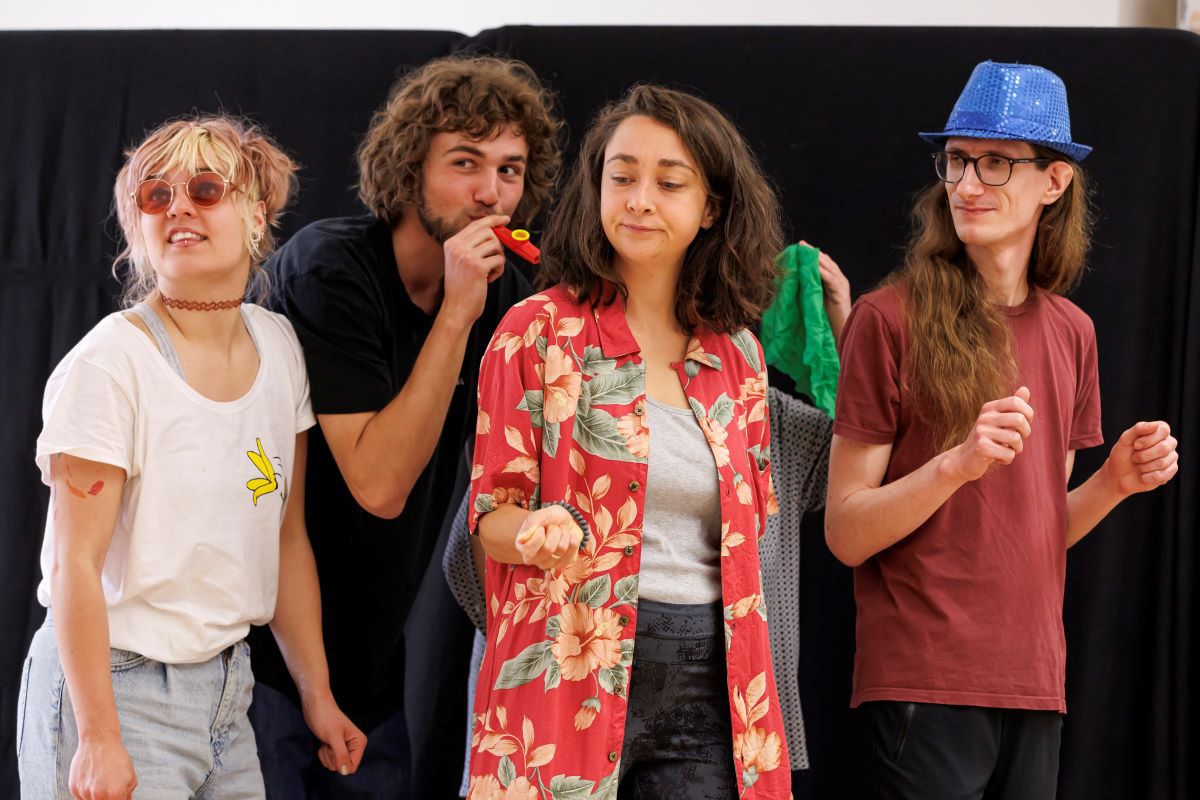 Fotografie von vier Teilnehmern